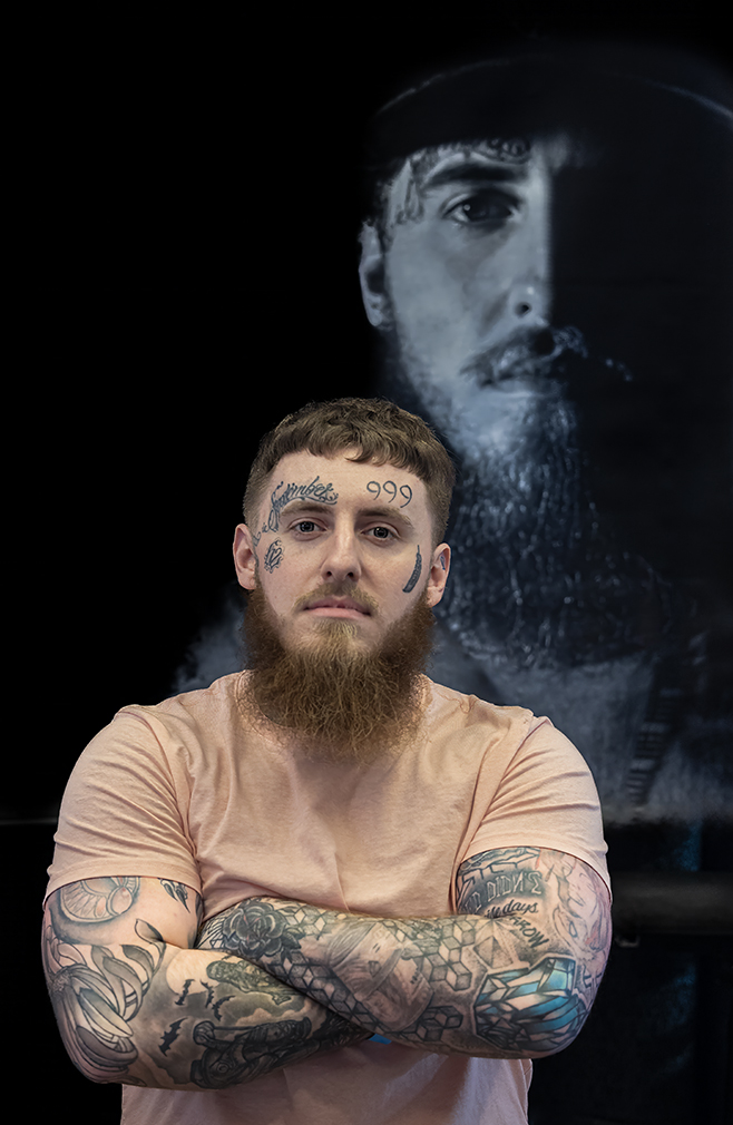 Tattoo Artist by Oliver Morton