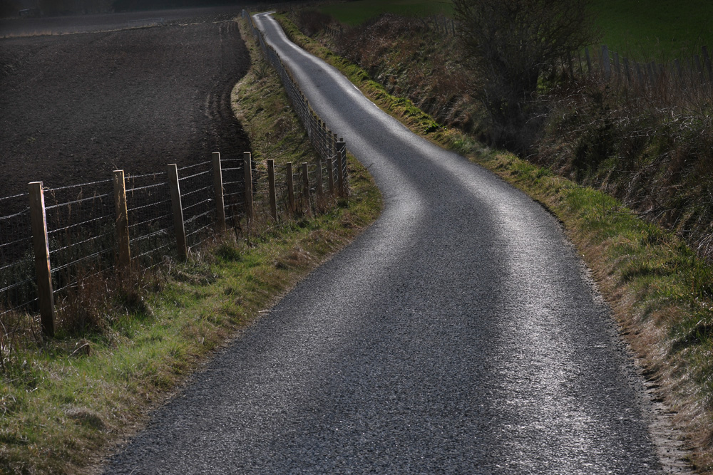 Long road, two bends by Alastair Cochrane
