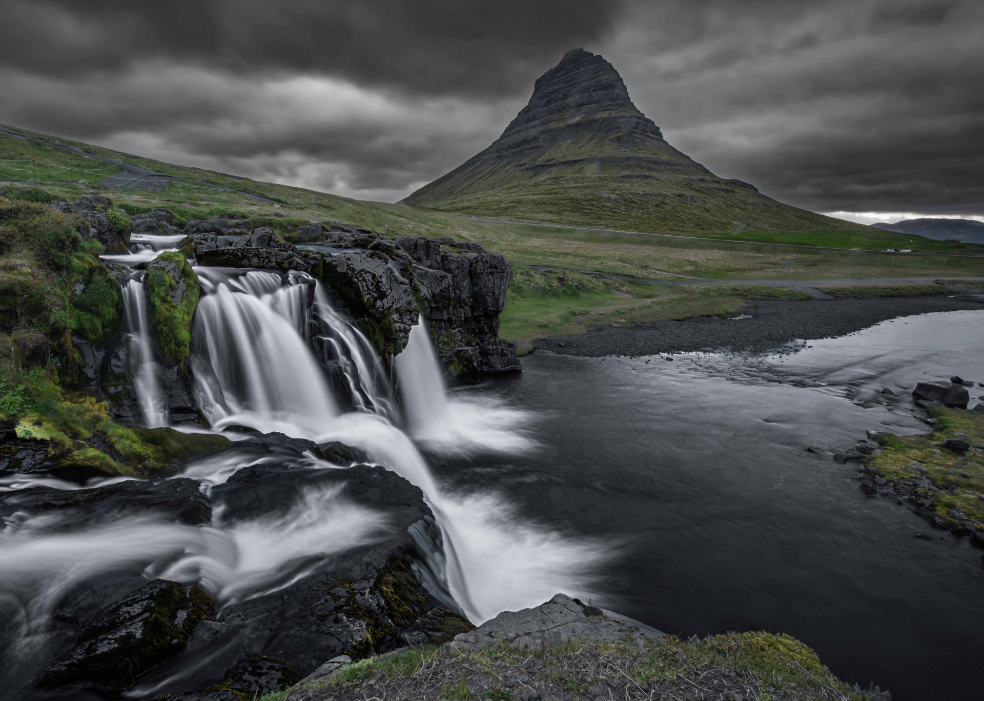 Kirkjufells foss waterfall at Kirkjufells by Raymond Tice